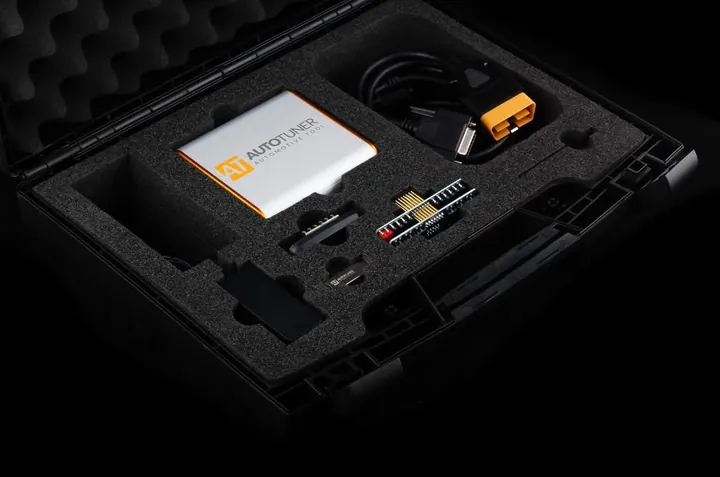 The AutoTuner tool in its case with its OBD lead and bench probes