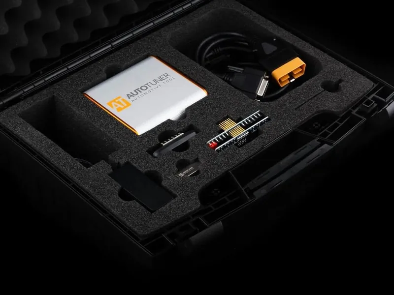 The AutoTuner tool in its case with its OBD lead and bench probes